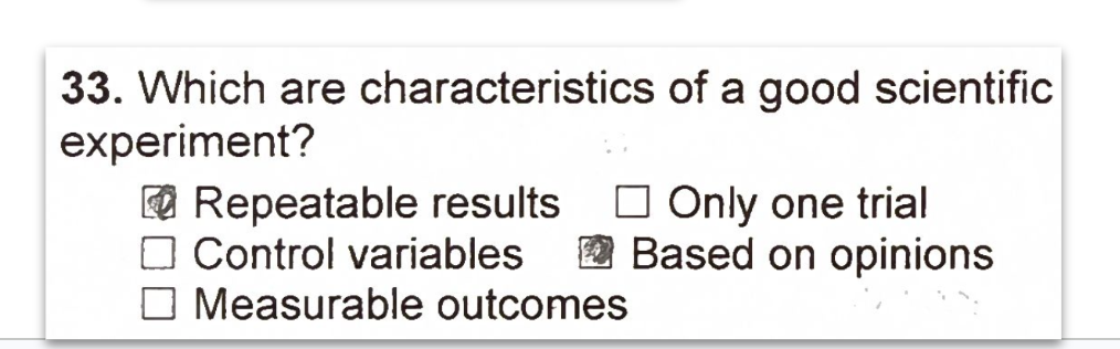 Multiple-choice question 33 from a chemistry test, with the student's boxes for Repeatable results and Based on opinions marked.